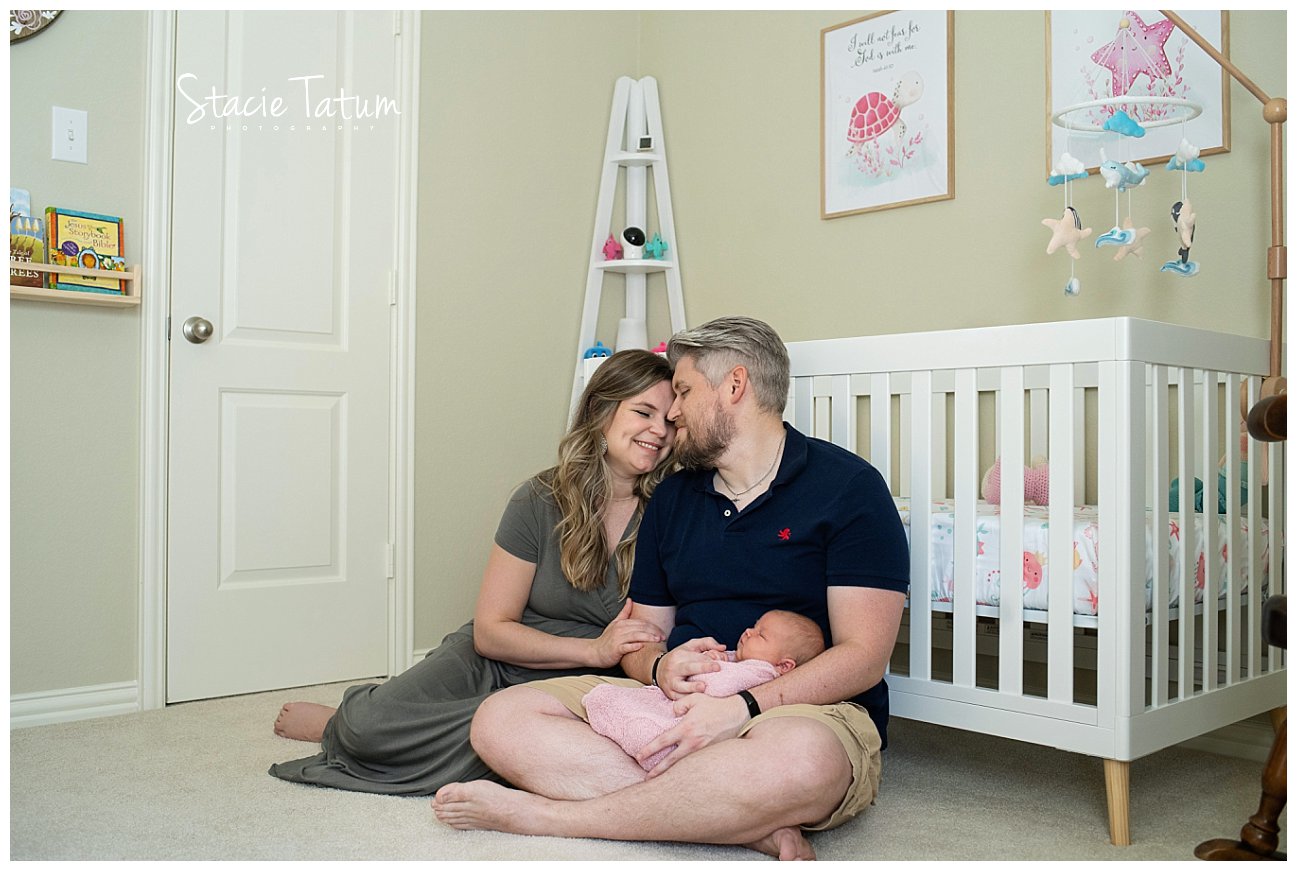 Dallas lifestyle newborn photography at home in nursery with crib.jpg